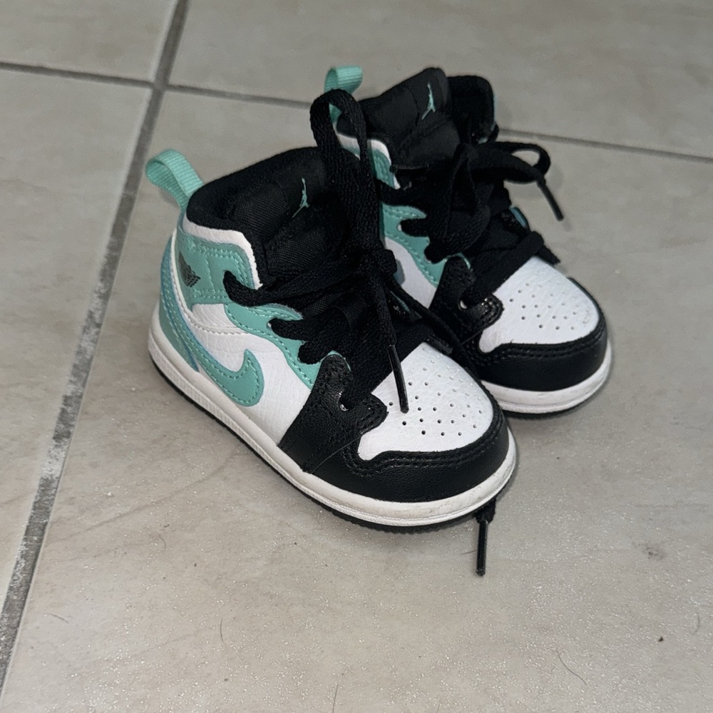 Turquoise white and black Jordan one 4C